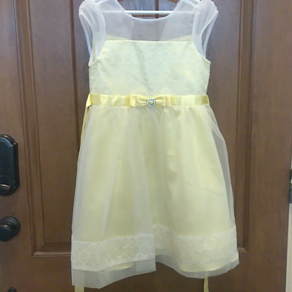 Yellow dress with ribbon waist and bow